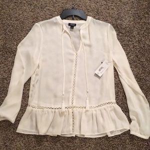 White/cream blouse